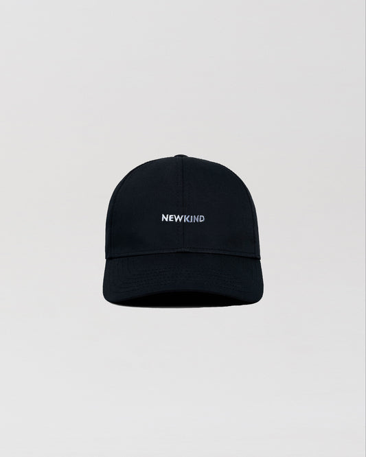 Newkind baseball cap in black. The cap features Newkind branding throughout and a metal clip fastening at the back.  - Embroidery logo  - 6 Panel baseball cap    - Composition: 100% cotton
